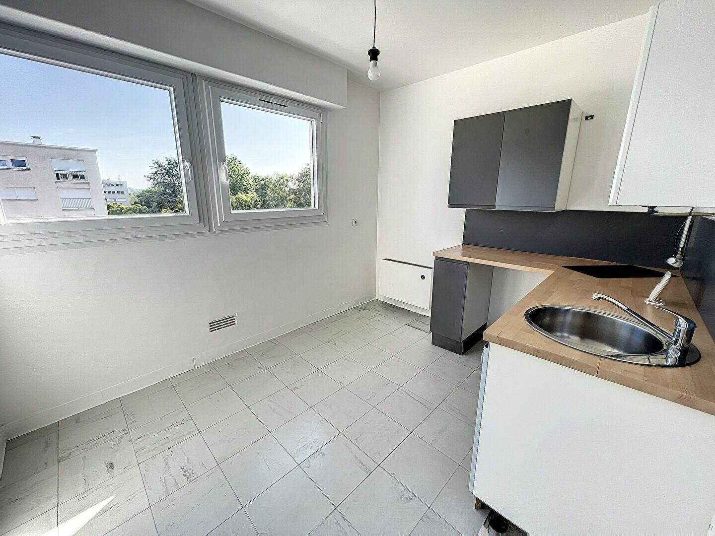 Appartement à vendre 1 34.9m2 à Saint-Jean-de-la-Ruelle vignette-2