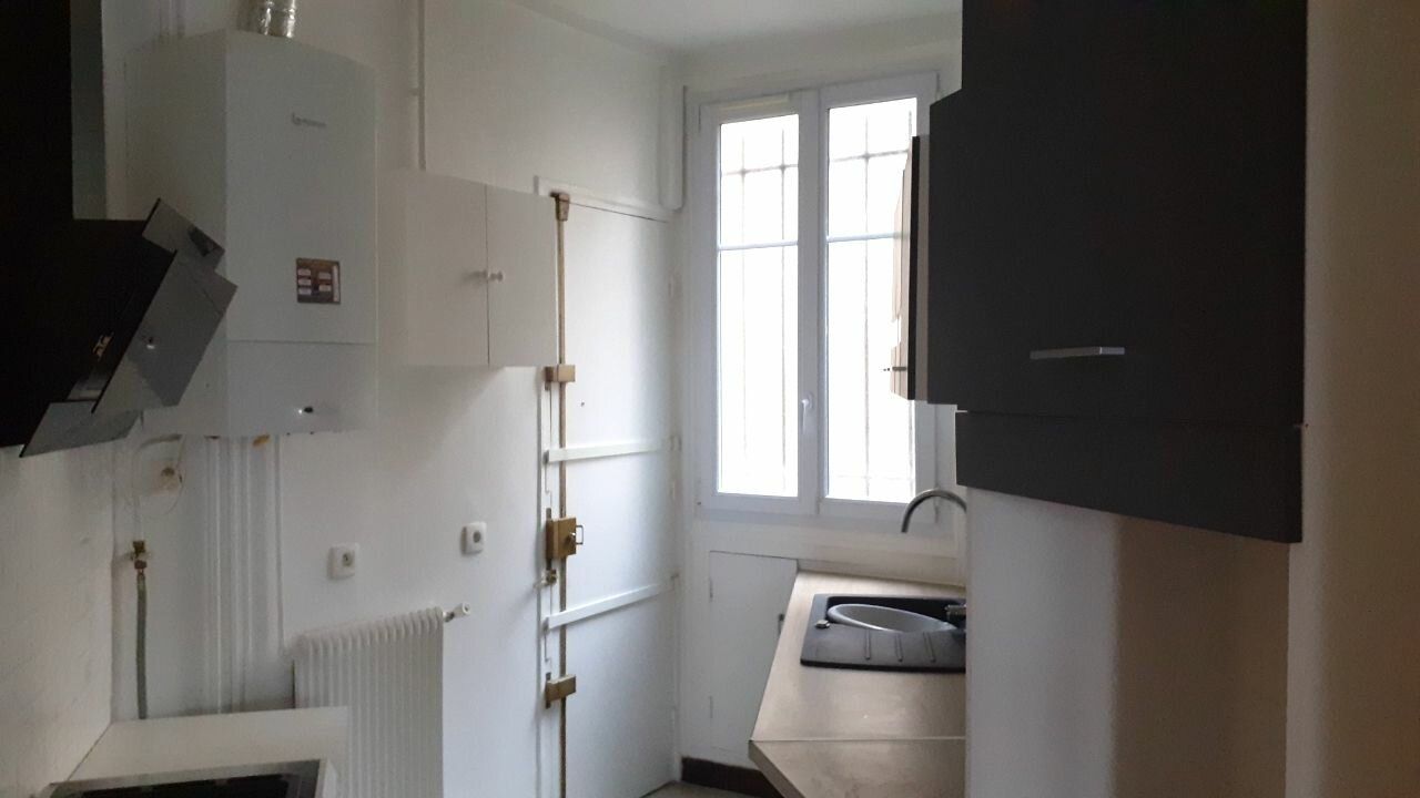 Appartement à louer 4 87.2m2 à Paris 15 vignette-13